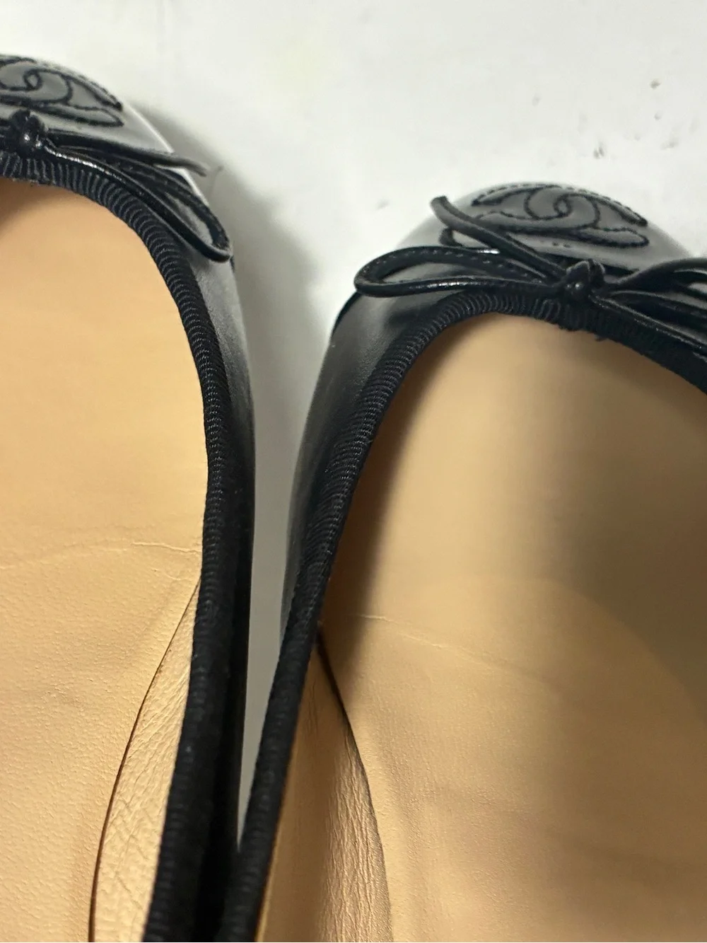 CHANEL Black Leather Cap-Toe Bow Ballet Flats